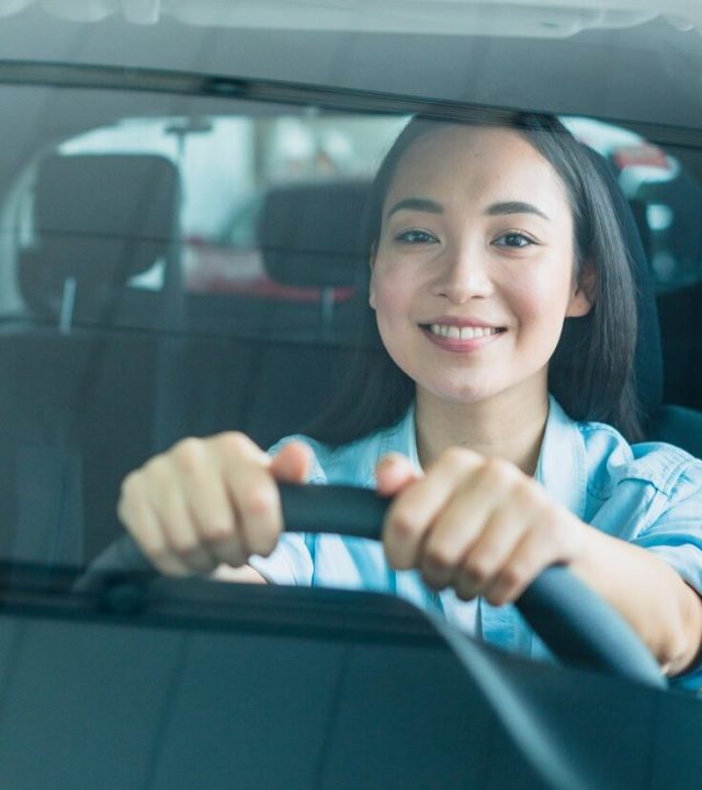 happy woman car dealership (1)